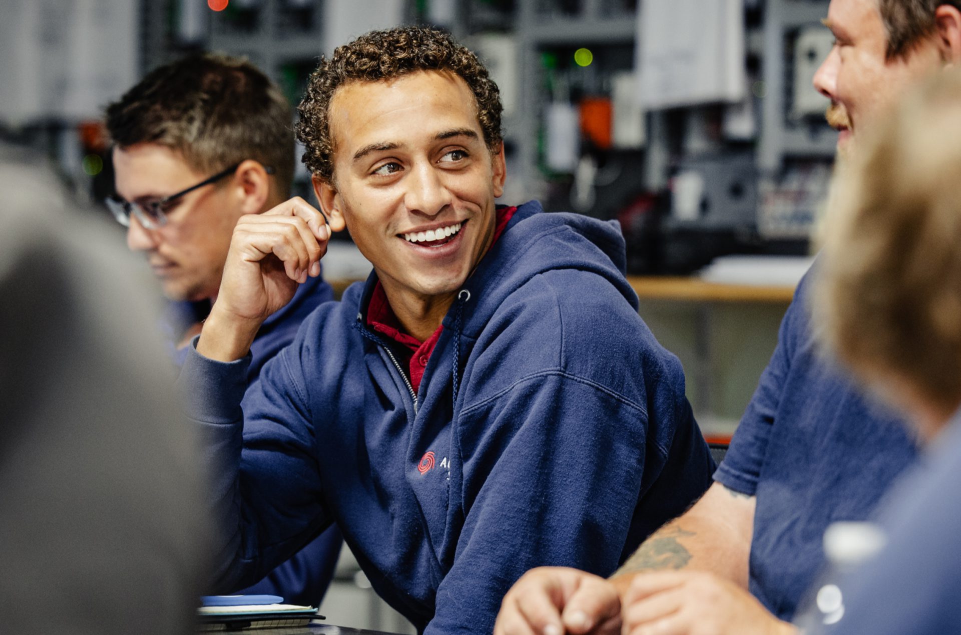 Service Technicians learning new techniques at an AC Systems Training class.